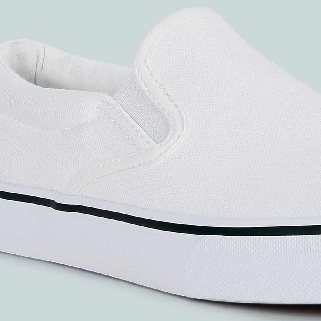 White Slip On Canvas Sneakers